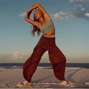 NWT Free People Movement Find Your Flow Pants in Argan Oil Size M
